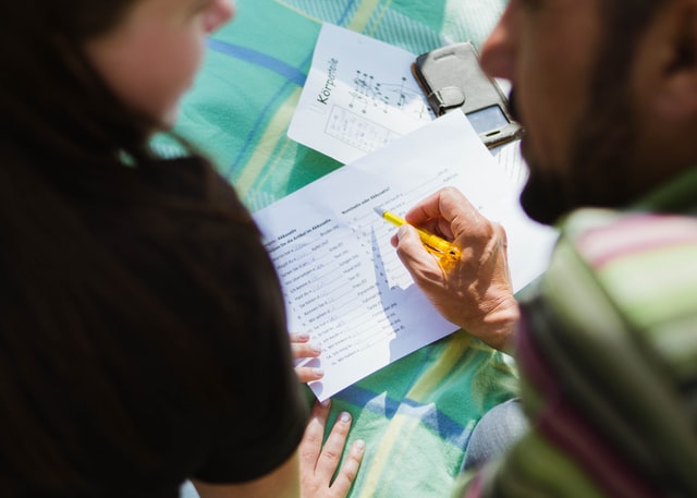 Two people studying language