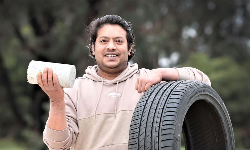 Mohammad Islam with the concrete made with recycled tyres.